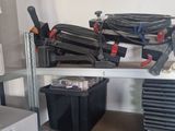 a lot of tools on the shelves in the room