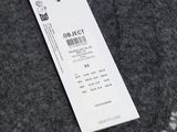 a bag with a price tag on it sitting on a table