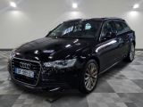 une image d'une audi wagon noire garée dans un garage