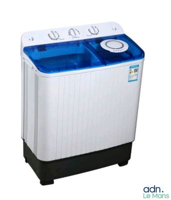 a close up of a small washing machine on a white background