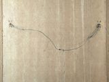 a picture of a piece of cardboard with wires in it