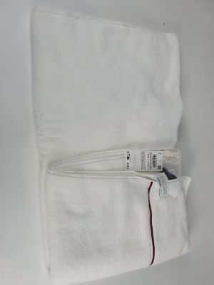 a white towel that has a tag on it