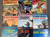 a lot of comic books that are on the table