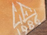 a close up of a baseball plate with the number 4 on it