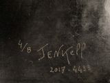 a black and white photo of a painting with writing on it