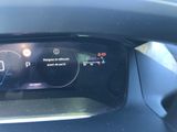 the dashboard of a car with a digital display on it