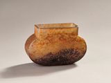 a small vase that is sitting on a table