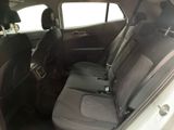 the back seats of a car are empty with no people in it