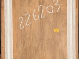 an image of a picture of a wooden frame with numbers written on it