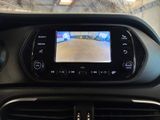 a picture of a car dashboard with a camera on it