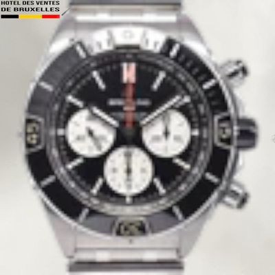 a close up of a watch on a white background