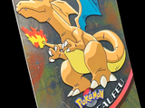 une photo d'une carte Pokémon sur laquelle figure l'image d'un dragon