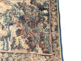 an image of a rug with a picture of a man and a woman