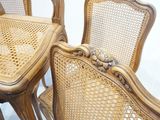 a lot of chairs that are sitting next to each other
