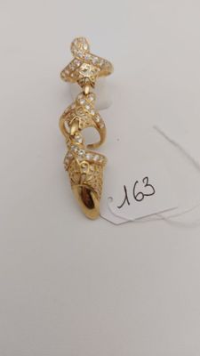 Bague or 750° doigt ornée de pierres - Poids brut : 12,1g