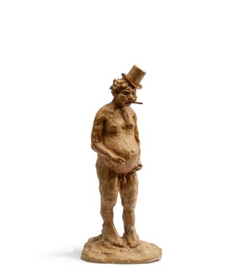 statue d'un homme portant un haut-de-forme et une cigarette à la bouche