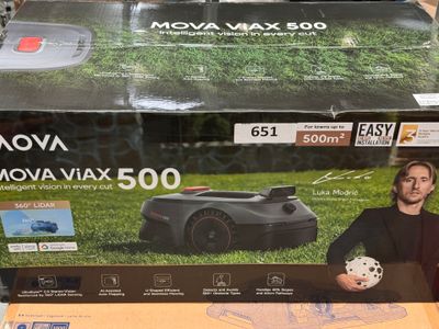 a box with a picture of a lawn mower on it