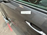 a sticker on the door of a car that says private