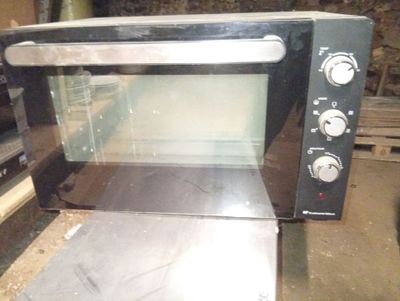 an image of a toaster oven sitting on a table