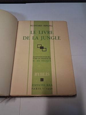 a book that is open on a white table