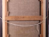 an old wooden easel with a piece of fabric hanging from it ' s sides