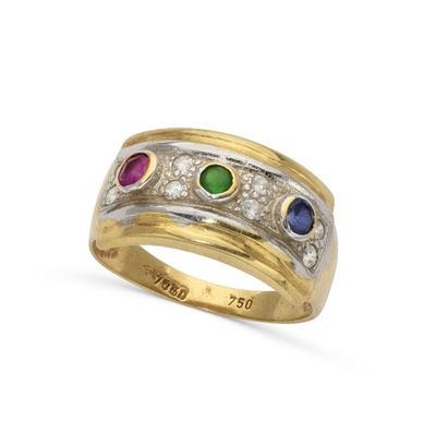 a close up of a ring with three different colored stones