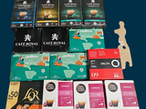 boxes of coffee are stacked on top of each other on a blue background