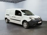 the white van is parked in the empty room of the building