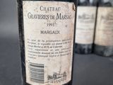 a bottle of wine that is sitting on a table