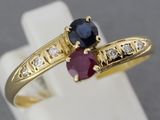 an image of a close up of a ring with two stones