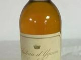 an image of a bottle of wine sitting on a table
