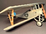 a toy airplane that is sitting on a table