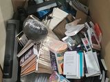 a cardboard box full of electronic equipment in it
