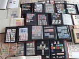 a lot of books and stamps on the floor
