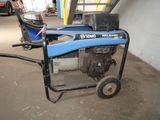 an image of a small generator in a garage