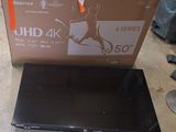 a laptop that is sitting on the floor next to a box