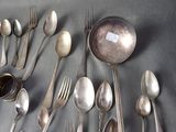 a lot of spoons and spoon spoons on the table