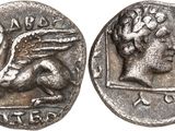 a silver coin with an image of a man on it