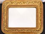 antique gold picture frame on black background with white background