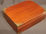 a small wooden box that is sitting on a table