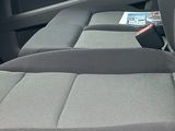 the interior of a car with the front seats down and the back seats down