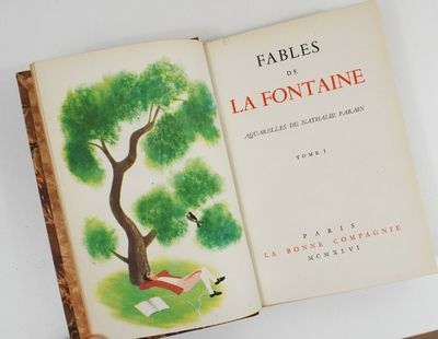 a book with a picture of a tree and a bird on it
