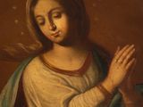 a painting of a woman kneeling with her hands clasped in prayer