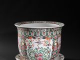 an image of a vase with a saucer on a saucer on a black background