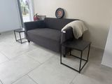 a living room with a couch and a coffee table