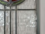 an image of a stained glass window with a star of david on it