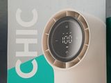 a box with a clock on it sitting on a table