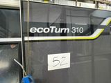 a sign that says ecotrum 310 on the side of a train