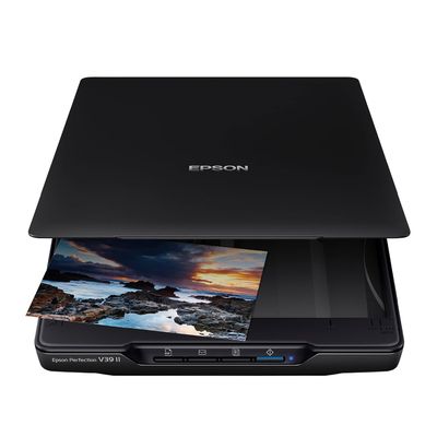 the epson photo printer is open and ready to be used
