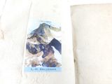 a picture of a book with a picture of a mountain on it
